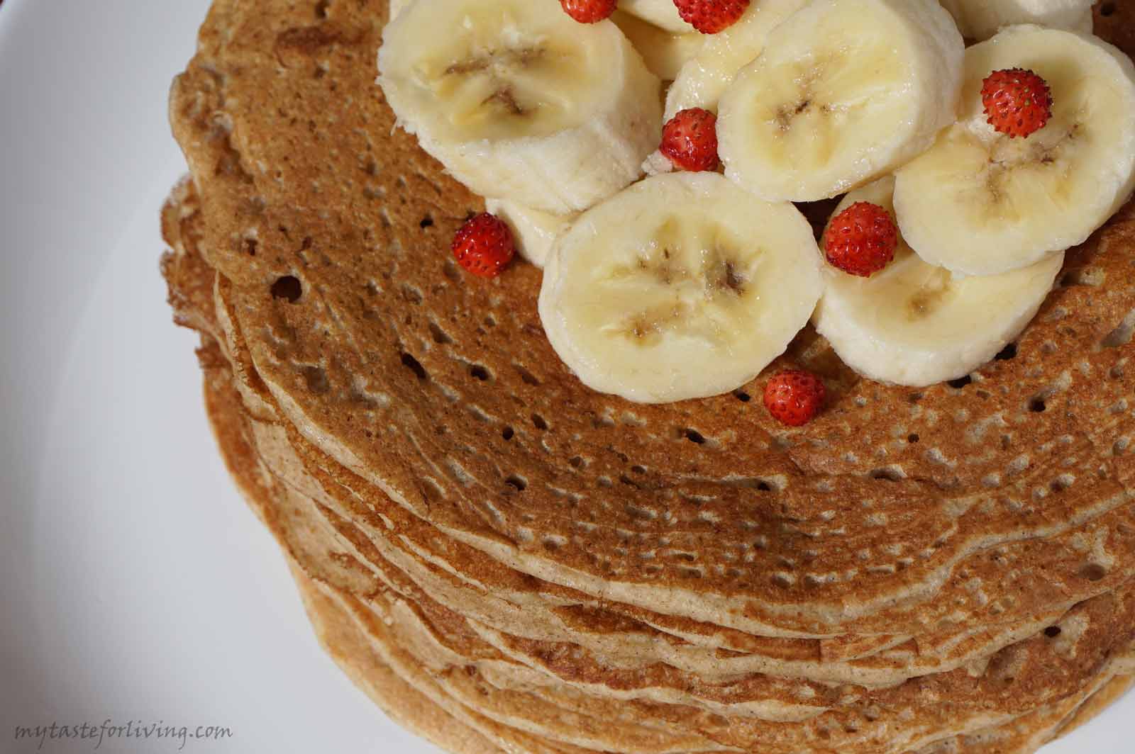 Fluffy banana pancakes made with whole wheat flour, cinnamon and non-dairy milk.