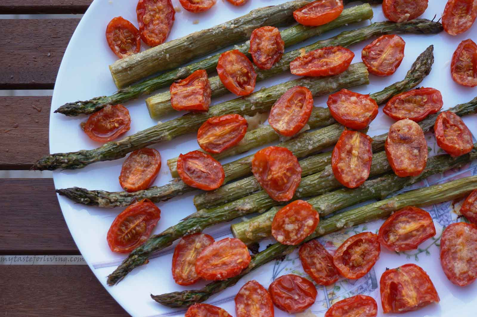 Baking asparagus is super easy and fast! I have been planning to share this recipe with you for a long time. You can serve the roasted asparagus with cherry tomatoes as a main dish or side dish. And if you grate cheese on top of them, you will lick your fingers. 