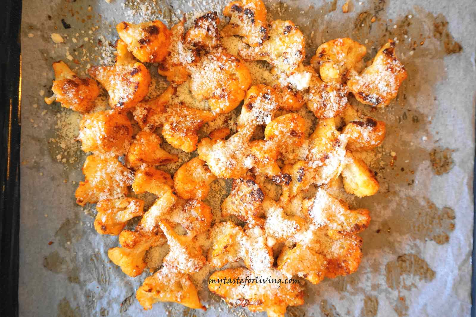 An easy and delicious recipe for fragrant cauliflower with garlic, baked in the oven with parmesan.