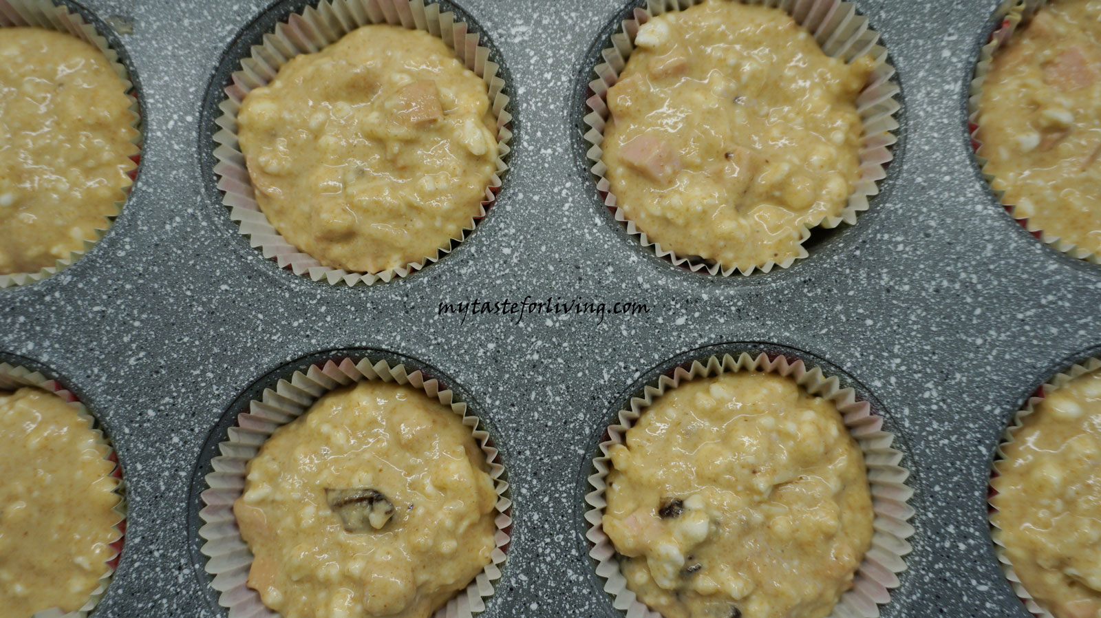 Delicious einkorn muffins with cottage cheese, yellow cheese, white cheese and olives. 